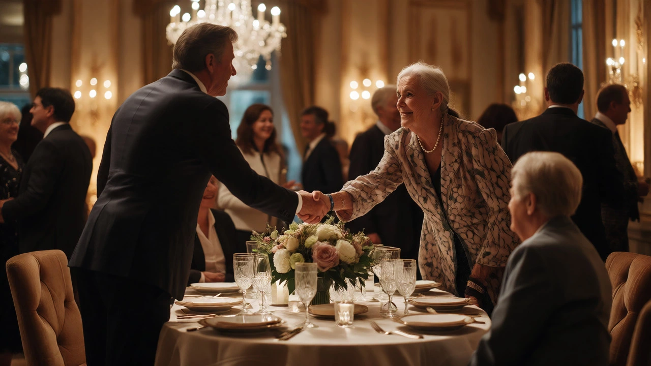 Host greeting a guest at a formal charity gala dinner event.